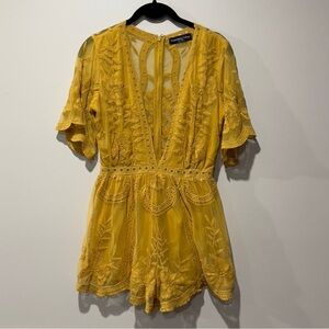 SOMETHING URBAN Size S Gold Sleeveless Floral Lace Romper Deep V Neck Back Zip.